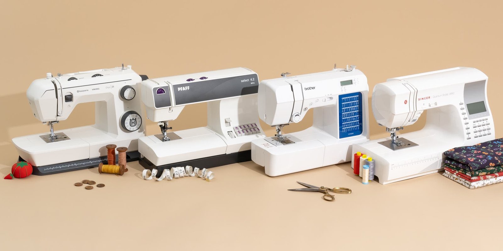 Side-by-side comparison of an electronic and a mechanical Husqvarna sewing machine.